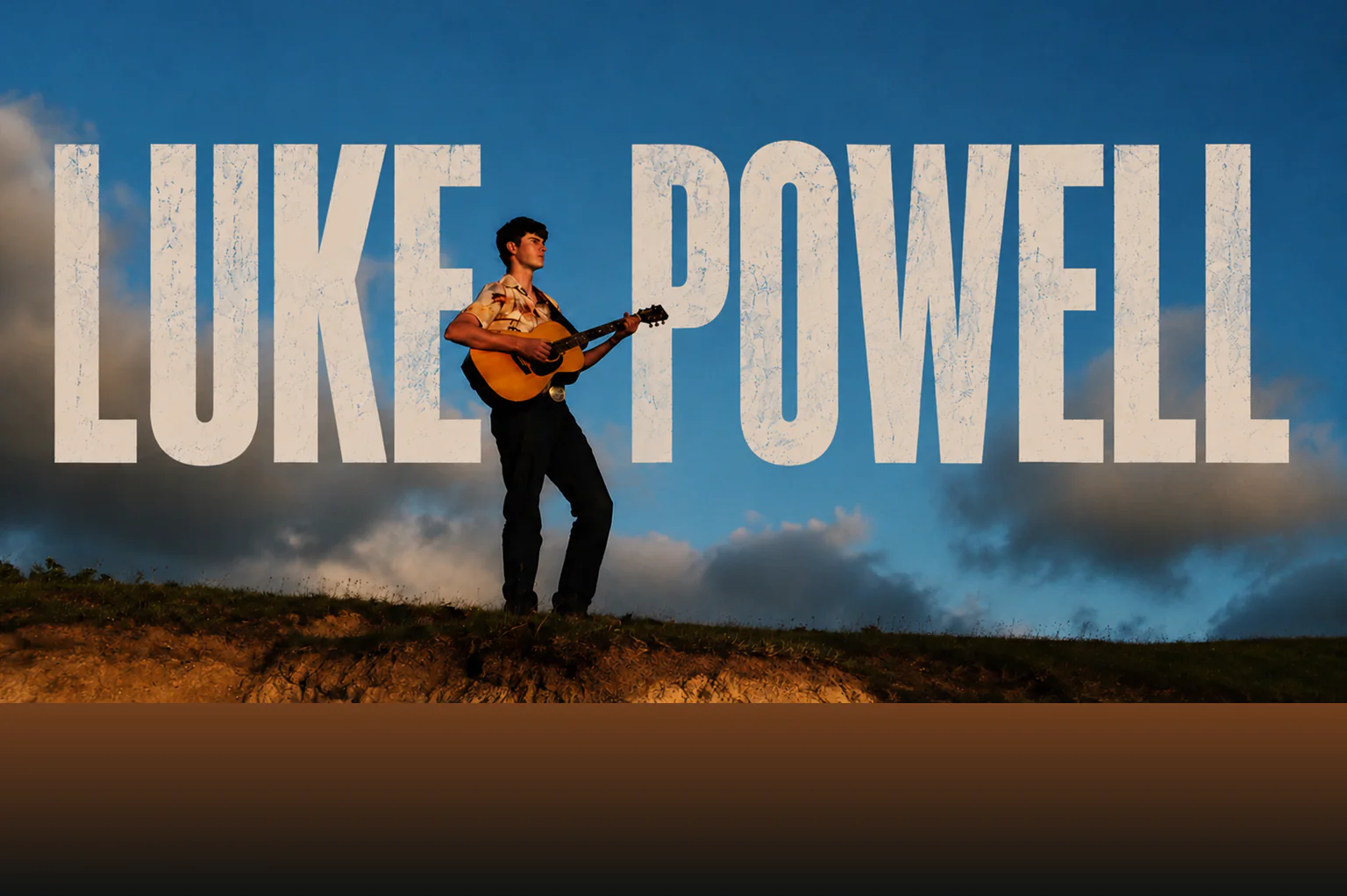 Luke Powell playing guitar on a California ridge beneath the Luke Powell wordmark
